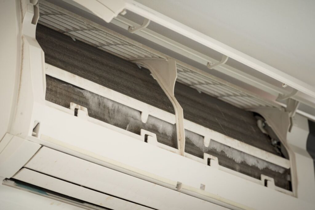 ice on coil cooler of dirty air conditioner