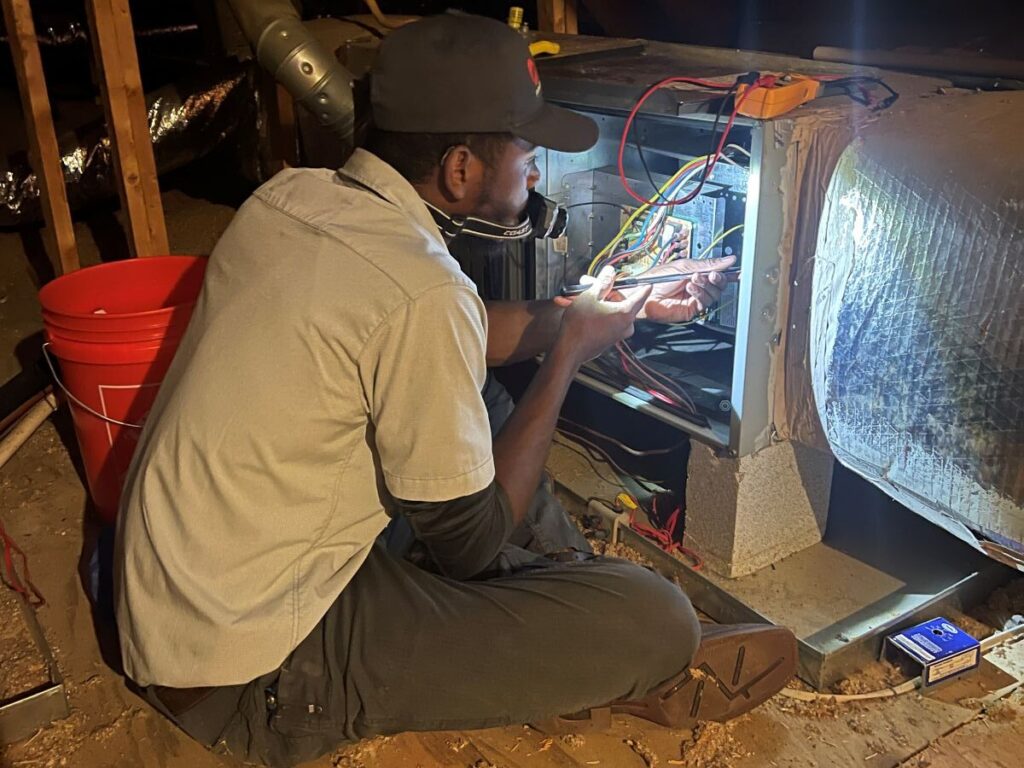 hvac damper worker installing new system