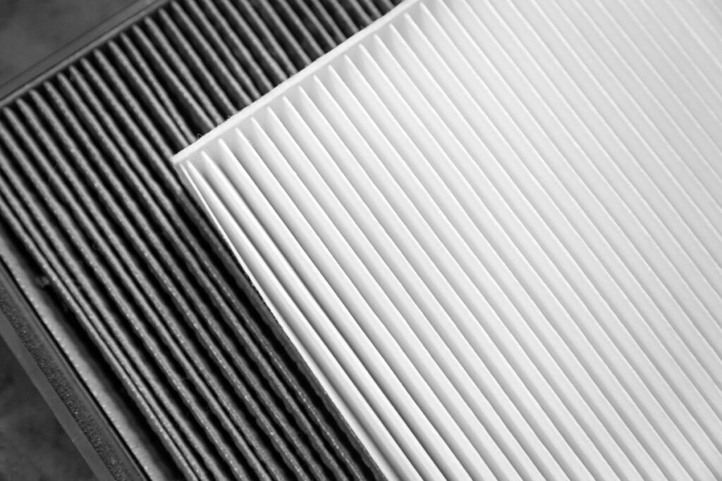 Close up, clean and dirty air filter